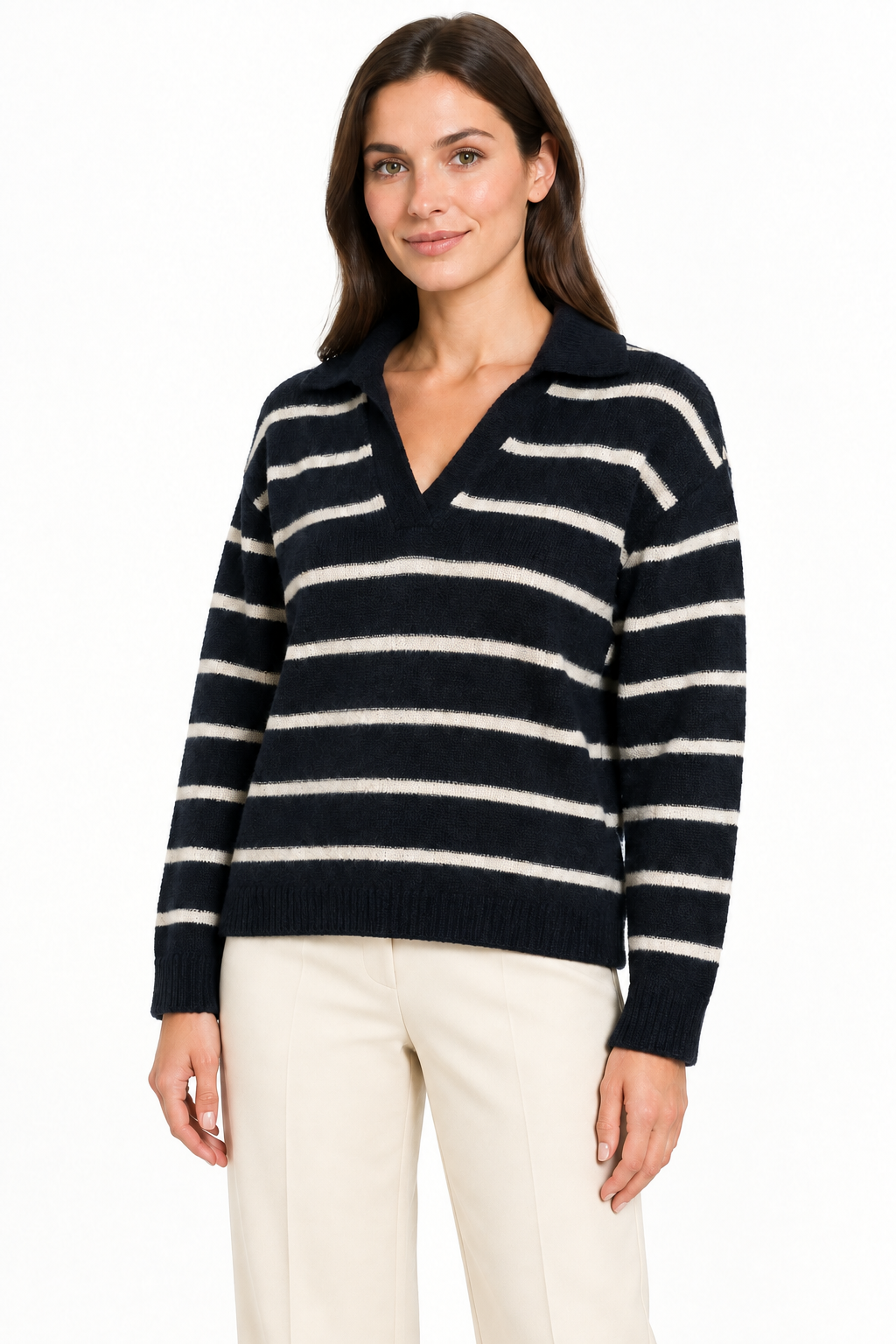 AI model wearing the navy and cream striped jumper with cream trousers