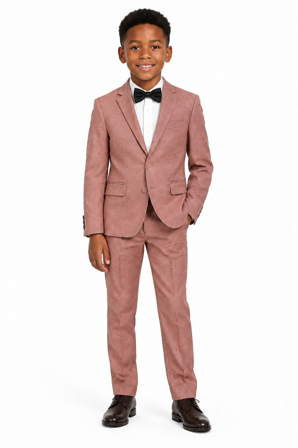 Boy wearing the salmon suit with a black bow tie