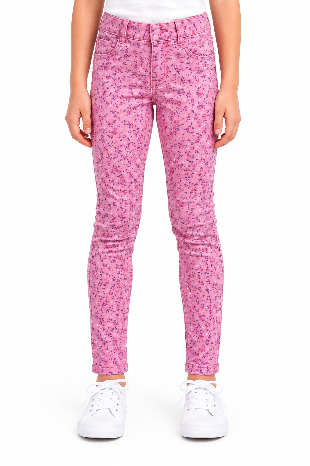 Girl wearing pink floral jeggings, waist to feet