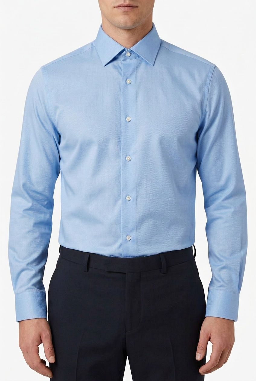 Model shirt in a slightly darker blue, tucked in and buttoned to the collar