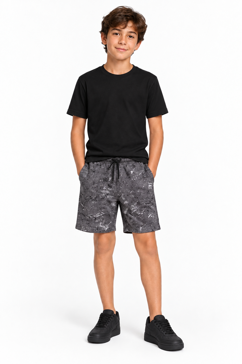 Model wearing grey-mix shorts with a black T-shirt and black trainers