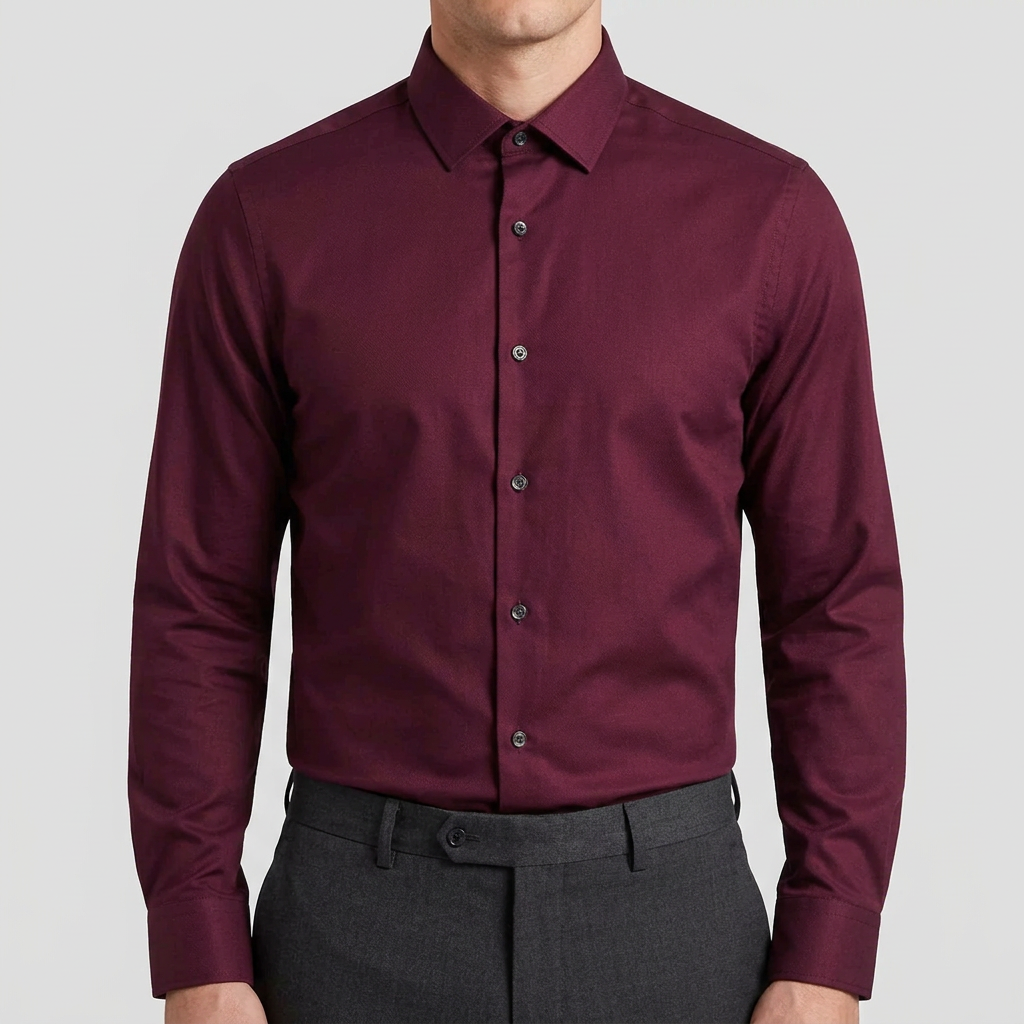 Model wearing the burgundy shirt tucked in and fully buttoned