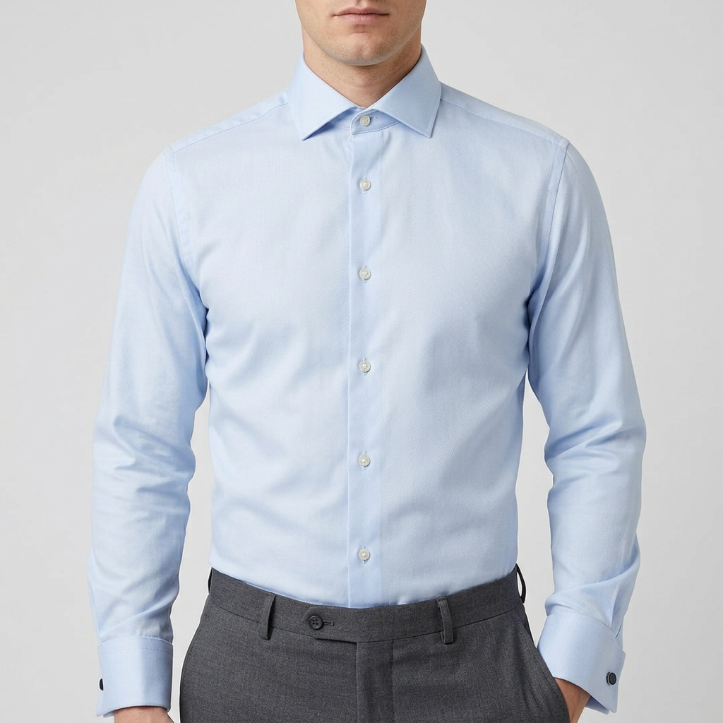 Model wearing the pale blue shirt tucked in with collar closed