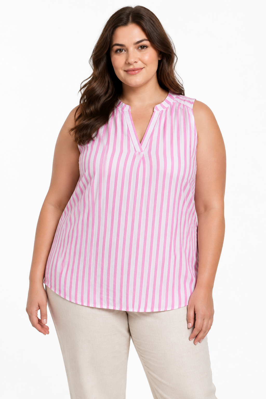 Plus-size model wearing the pink-and-white striped blouse
