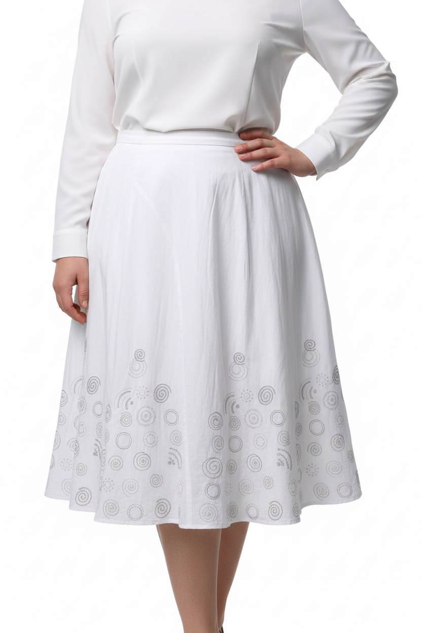 Plus-size model wearing white embroidered skirt