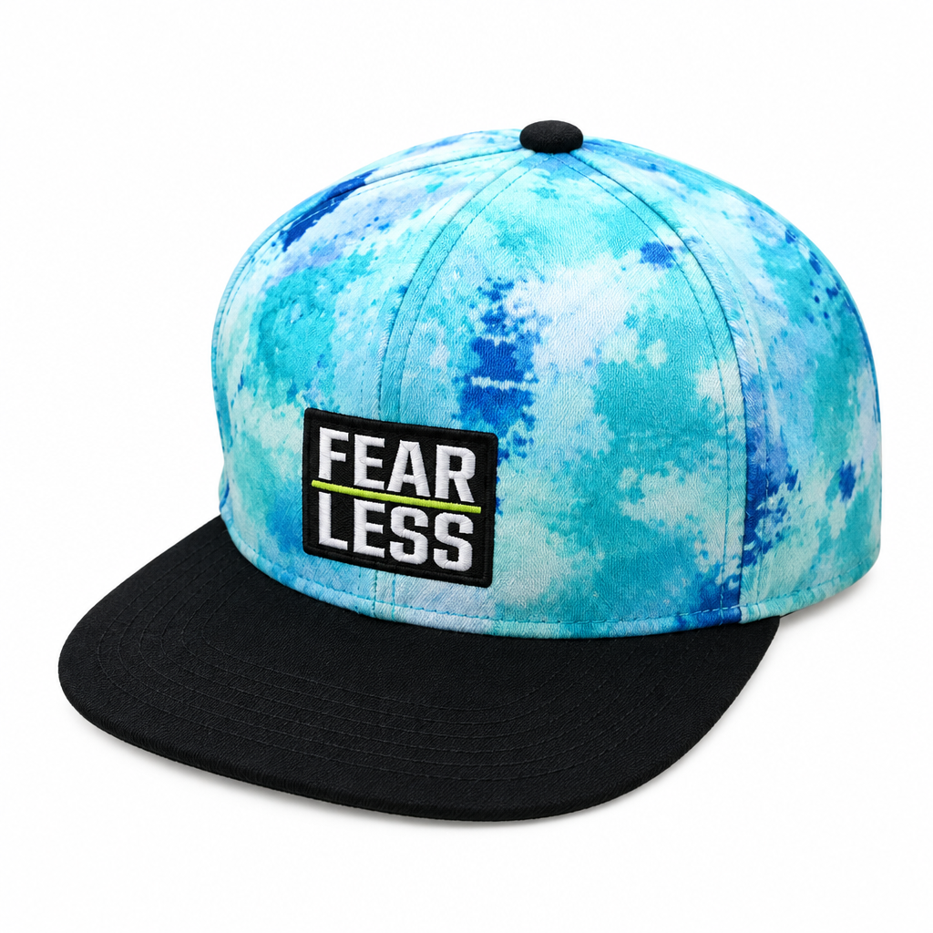 Refined photo of the boys' blue tie-dye FEAR LESS snapback cap, tag removed