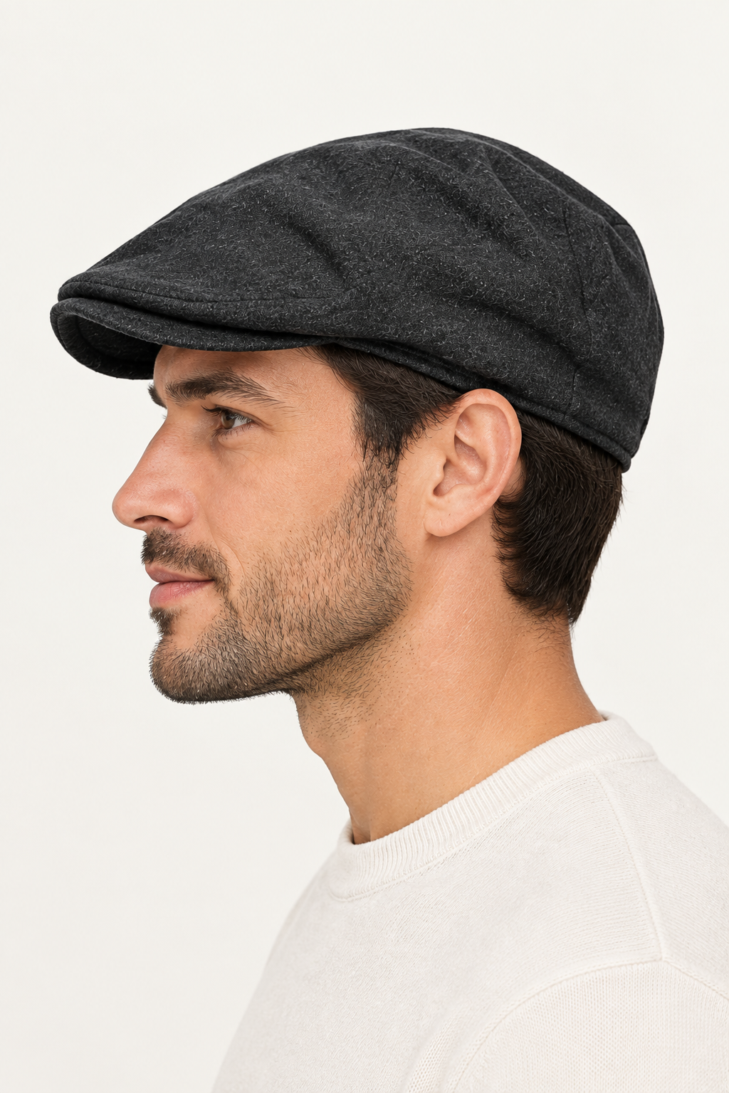 Side-profile model wearing the grey flat hat
