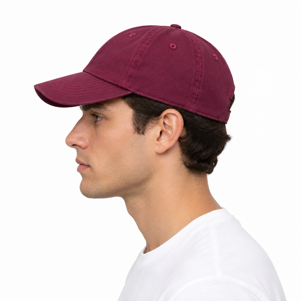 Side view of model wearing the burgundy cap