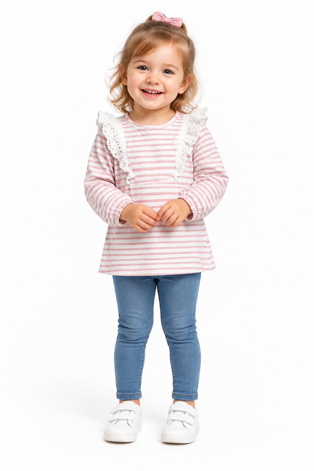 Toddler girl wearing striped ruffle top, full body