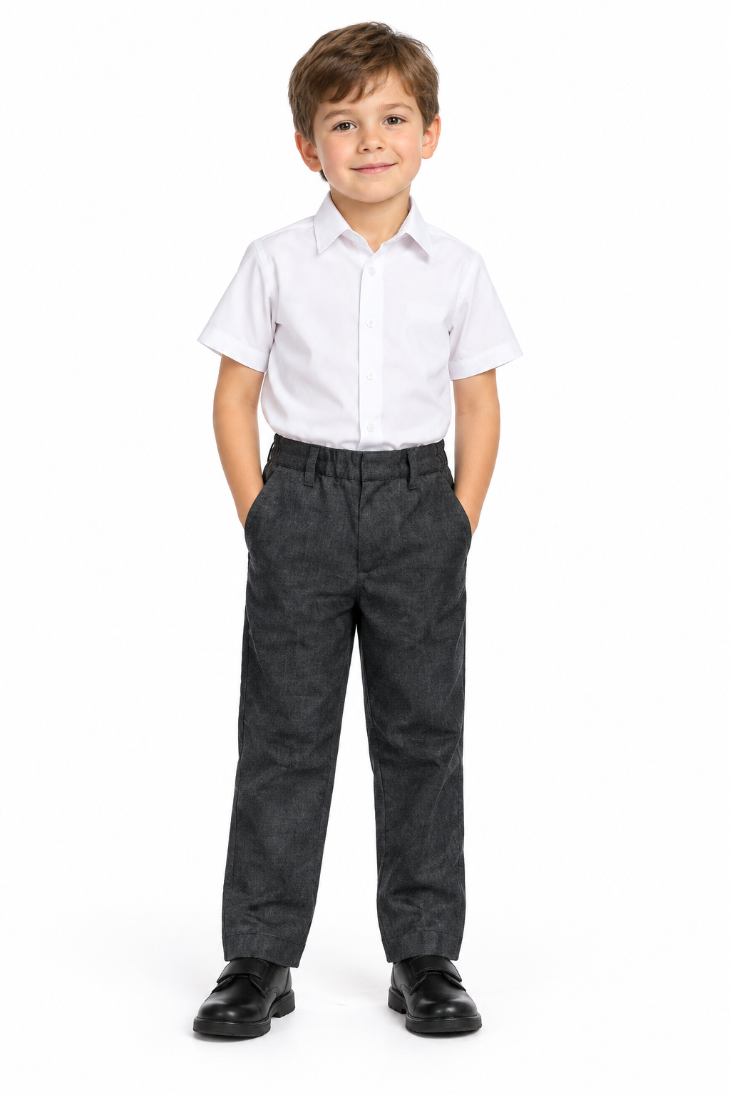 Young model wearing grey school trousers with a white short-sleeve shirt and black shoes